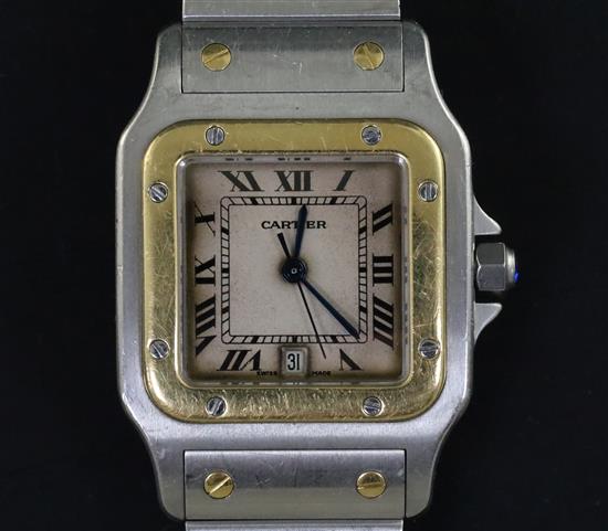 A gentlemans 1990s stainless steel and gold Cartier Santos quartz wrist watch,